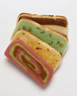 Colourful slices of assorted marzipan loaves Colourful slices of assorted marzipan loaves