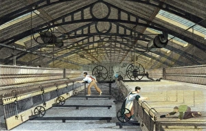 Cotton manufacture: mule spinning. Note boy on right employed to crawl under threads & Cotton manufacture: mule spinning. Note boy on right employed to crawl under threads &