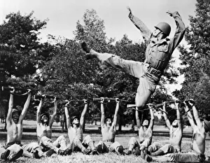 <b class=qtipBold><figcaption>Dancer Jose Limon Leaps High</figcaption></b><br>Camp Lee, Virginia: September 8, 1943. Nationally famous dancer, Pvt. Jose Limon, leaps high as a part of an all-soldier revue for the Third War Loan Drive.<br><em>© Underwood Archives/UIG</em> Dancer Jose Limon Leaps High