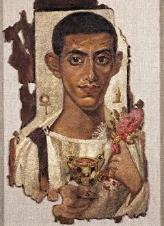 Egyptian civilization, Portrait of young man holding ciborium and flowers, Distemper painting on wood, From Al Fayyum