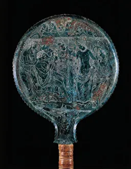 Engraved bronze mirror from Todi, Perugia province, Italy, Etruscan civilization Engraved bronze mirror from Todi, Perugia province, Italy, Etruscan civilization