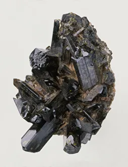 Epidote crystals in rock groundmass, close-up Epidote crystals in rock groundmass, close-up
