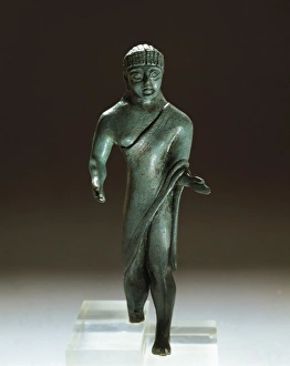 Etruscan bronze figurine of togaed man, from Villa Cassarini, Bologna, Italy, 500 B.C Etruscan bronze figurine of togaed man, from Villa Cassarini, Bologna, Italy, 500 B.C