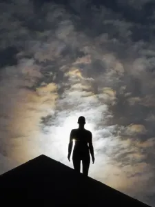 Anthony Gormley sculpture print on Oxford roof