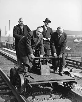 <b class=qtipBold><figcaption>Executives Commute By Handcar</figcaption></b><br>Chicago, Illinois: March 5, 1930 Executives celebrate the joining of New York and Chicago by the longest stretch of the heaviest rail in the world.<br><em>© Underwood Archives/UIG</em> Executives Commute By Handcar
