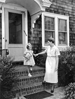 <b class=qtipBold><figcaption>First Day Of School</figcaption></b><br>United States: c. 1930. A mother takes her daughter by the hand on the way to the first day of school.<br><em>© Underwood Archives/UIG</em> First Day Of School