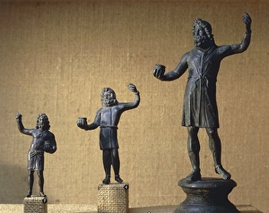 France, Ardeche, Statue representing the Gallic God Sucellus holding an olla France, Ardeche, Statue representing the Gallic God Sucellus holding an olla