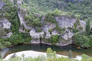 France, Gorges du Tarn, Castelbouc, village built below cliff at the edge of the Tarn France, Gorges du Tarn, Castelbouc, village built below cliff at the edge of the Tarn