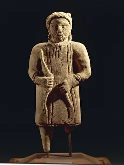 France, Sarthe, Mont-Saint-Jean, Sculpture representing a foreign God, limestone France, Sarthe, Mont-Saint-Jean, Sculpture representing a foreign God, limestone