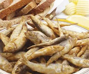Fried whitebait, served with sliced bread and butter Fried whitebait, served with sliced bread and butter