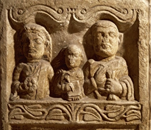 Funerary stele of Aurelio Secundus, his wife and child writing on diptych, from Celje Funerary stele of Aurelio Secundus, his wife and child writing on diptych, from Celje
