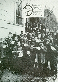 German children receiving soup at communal kitchen German children receiving soup at communal kitchen