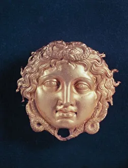 Gold wall lamp shaped as Medusas head, from the Royals Tombs at Vergina, Greece Gold wall lamp shaped as Medusas head, from the Royals Tombs at Vergina, Greece