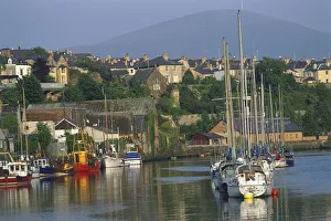 Great Britain, Wales, Caernarfon, quayside marina with town and mountain in background Great Britain, Wales, Caernarfon, quayside marina with town and mountain in background