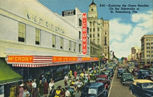 Green Benches Along a Busy Street. ca. 1948, Saint Petersburg, Florida, USA Green Benches Along a Busy Street. ca. 1948, Saint Petersburg, Florida, USA