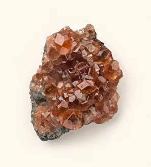 Grossular garnet crystals on rock surface, close-up Grossular garnet crystals on rock surface, close-up