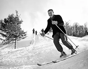 <b class=qtipBold><figcaption>A Happy Skier In Vermont</figcaption></b><br>East Corinth, Vermont: c. 1952. A skier in Vermont coming downhill with a big grin on his face.<br><em>© Underwood Archives/UIG</em> A Happy Skier In Vermont