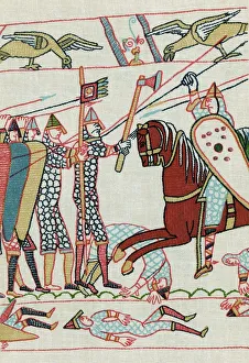 Harold II's (c1022-1066) Anglo-Saxon troops (left) led by armoured standard bearer Harold II's (c1022-1066) Anglo-Saxon troops (left) led by armoured standard bearer