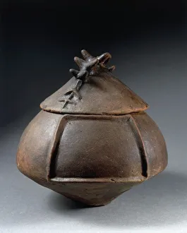 <b class=qtipBold><figcaption>Hut-shaped urn with movable lid</figcaption></b><br>Latins civilization, 5th century b.C. Hut-shaped urn with movable lid. Hut-shaped urn with movable lid