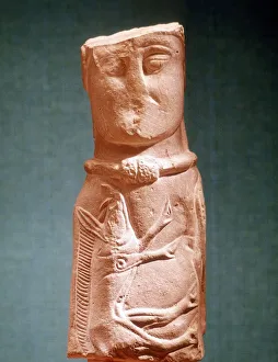 Image of Celtic deity with wild boar and wearing torque. Stone. Musee de St Germain Image of Celtic deity with wild boar and wearing torque. Stone. Musee de St Germain