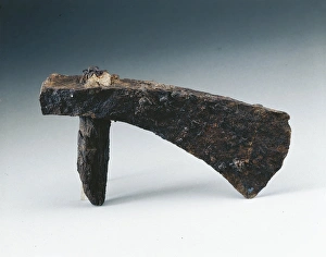 Iron hatchet with part of handle, from Pompei Iron hatchet with part of handle, from Pompei