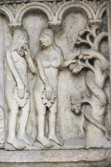 Italy, Emilia Romagna Region, Modena, marble bas-relief depicting temptation of Adam Italy, Emilia Romagna Region, Modena, marble bas-relief depicting temptation of Adam