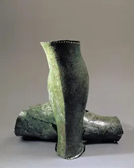 Italy, Lombardy, Bronze greaves, leg armor worn below knee, from Golasecca Culture Italy, Lombardy, Bronze greaves, leg armor worn below knee, from Golasecca Culture