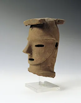 Japan, Saitama, Haniwa (funerary statuette) head, Kofun period, terracotta Japan, Saitama, Haniwa (funerary statuette) head, Kofun period, terracotta