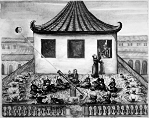 Jesuit Missionaries in Siam projecting image of a solar eclipse through telescope Jesuit Missionaries in Siam projecting image of a solar eclipse through telescope
