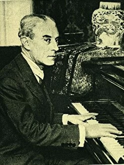 Maurice Gallery: (Joseph) Maurice Ravel (1875-1937) French composer, at the piano. After a photograph