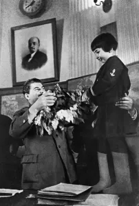 Joseph stalin receiving a bouquet of flowers from engelsina (gelya) markizova Joseph stalin receiving a bouquet of flowers from engelsina (gelya) markizova