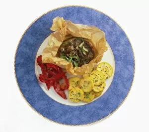 Lamb Kleftiko on blue and white plate, close-up