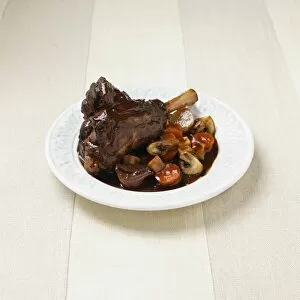 Gravy Collection: Lamb shank with mushrooms and carrots in red wine sauce