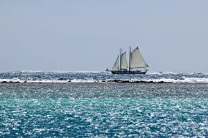Lesser Antilles, Saint Vincent and the Grenadines, sailing boat near the horizon Lesser Antilles, Saint Vincent and the Grenadines, sailing boat near the horizon