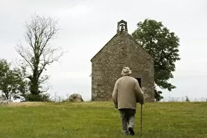 Images Dated 26th February 2000: Man walking up to Mont-Dol chapel