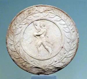 Marble disk with Satyr carrying grapes Marble disk with Satyr carrying grapes