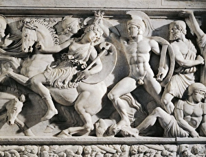 Marble sarcophagus with marble group on lid representing deceased couple and relief depicting battle between Greeks Marble sarcophagus with marble group on lid representing deceased couple and relief depicting battle between Greeks