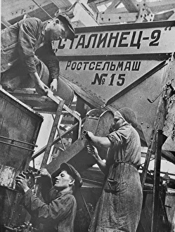 Men and women workers at a combine harvester factory, Rostov-on-Don, USSR, 1930-1940 Men and women workers at a combine harvester factory, Rostov-on-Don, USSR, 1930-1940