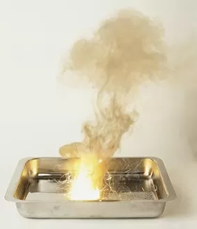 Metal tray with explosive thermite reaction occuring