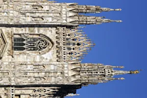 Milan Cathedral. The west facade of the Duomo. The Gothic style cathedral is dedicated to St Mary. Italy Milan Cathedral. The west facade of the Duomo. The Gothic style cathedral is dedicated to St Mary. Italy