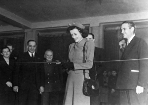 Miss harriman cutting the ribbon at the opening of the prefabricated housing in the usa Miss harriman cutting the ribbon at the opening of the prefabricated housing in the usa