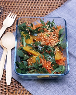 Moroccan rocket, carrot and orange salad with paprika dressing and sesame seeds Moroccan rocket, carrot and orange salad with paprika dressing and sesame seeds