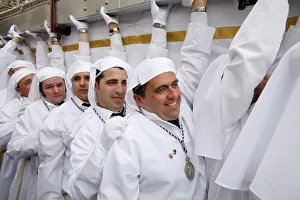 Easter Week Gallery: Nazarenos carrying the Rocio float at Easter week procession