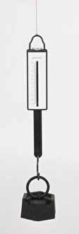 <b class=qtipBold><figcaption>Newton meter pulled by weight</figcaption></b><br><em>© Dorling Kindersley/UIG</em> Newton meter pulled by weight