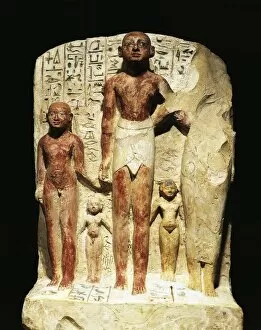 Painted limestone group statue of Meinekhet with family, from Reign of Thutmose