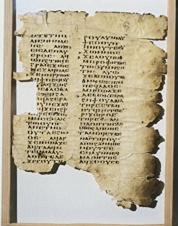 Parchment manuscript of the Gospel of Saint Luke, biblical uncial script Parchment manuscript of the Gospel of Saint Luke, biblical uncial script