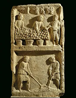 The Pillar of the Farmer, relief depicting a fruit market and two farmers tilling the soil The Pillar of the Farmer, relief depicting a fruit market and two farmers tilling the soil