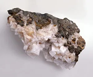 Pink-white chabazite crystals in basalt groundmass Pink-white chabazite crystals in basalt groundmass