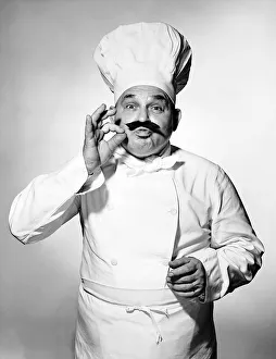 <b class=qtipBold><figcaption>Portrait of chef with moustache</figcaption></b> Portrait of chef with moustache