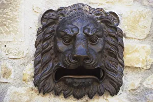 Postbox in shape of a lions head, mouth as slot Postbox in shape of a lions head, mouth as slot